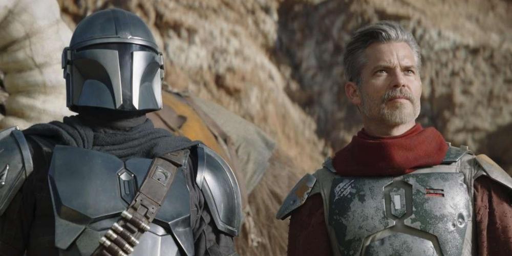 Din Djarin aux côtés de Cobb Vanth, qui porte l’armure verte de Boba Fett