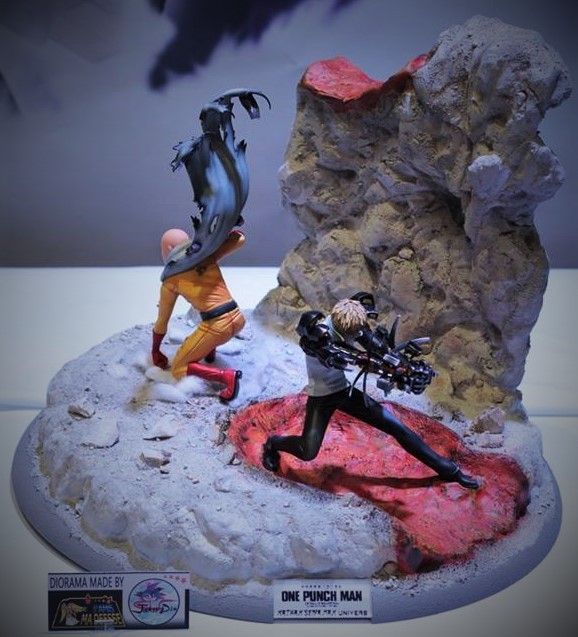 Diorama One Punch Man&nbsp;: Saitama et Genos sur un sol rocheux craquelé