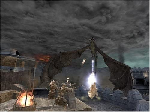 Gandalf affronte un Nazgûl sur sa monture ailée au sommet des remparts