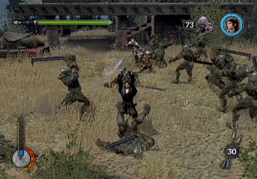 Aragorn encerclé par des orques dans un champ d’herbes sèches, capture des Deux Tours
