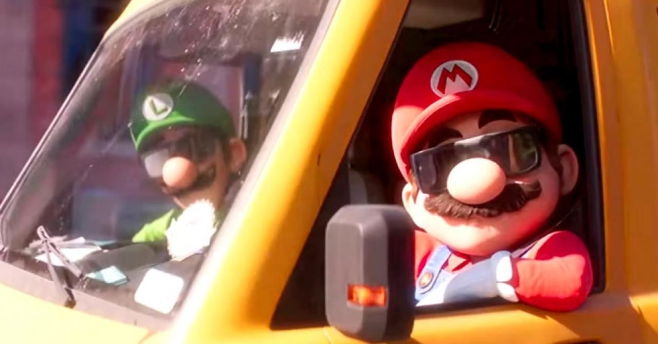 Mario au volant de la camionnette jaune, Luigi assis à côté de lui