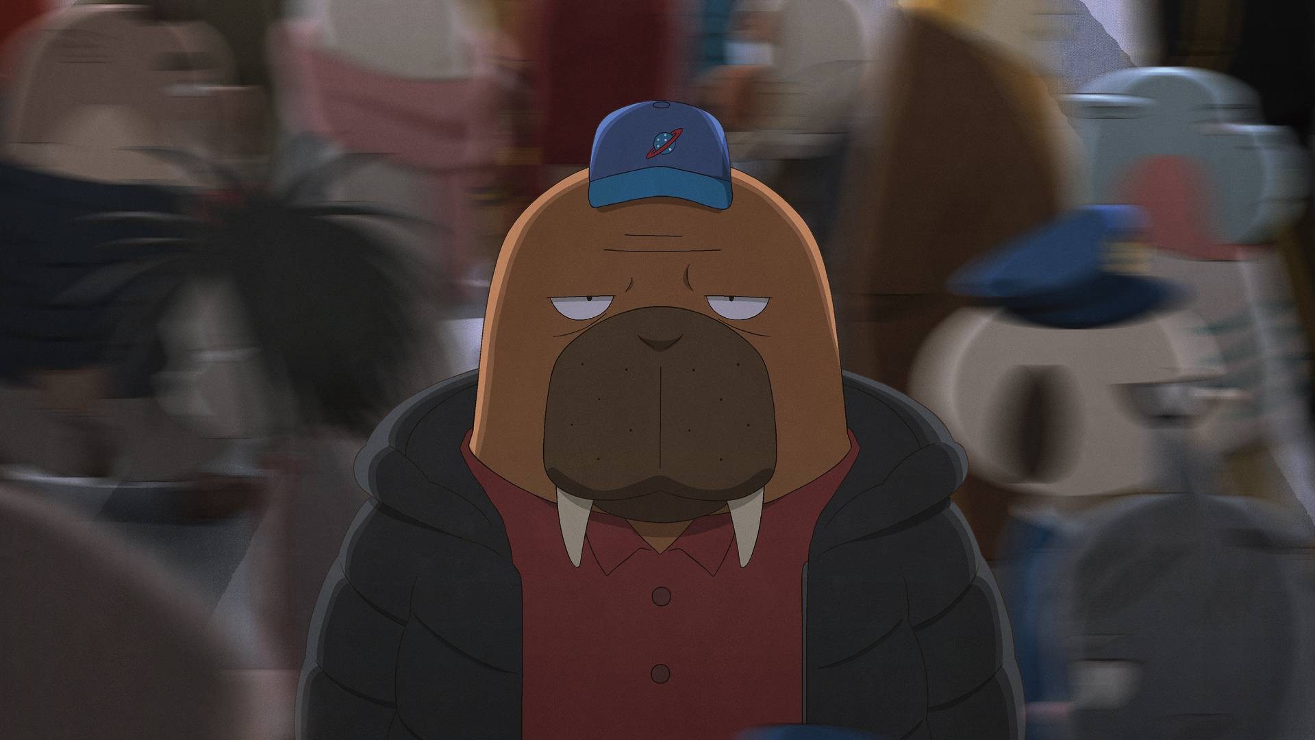 Odokawa, casquette bleue et doudoune noire, au milieu d’une foule floue