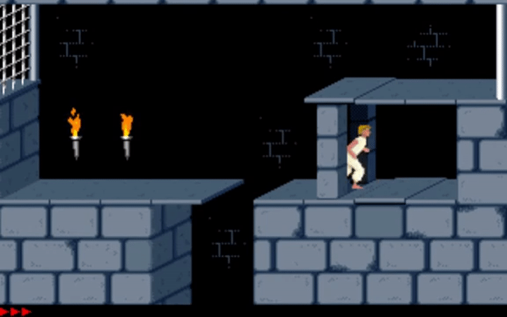 Animation du premier Prince of Persia&nbsp;: le prince court dans un donjon en pierre éclairé de torches
