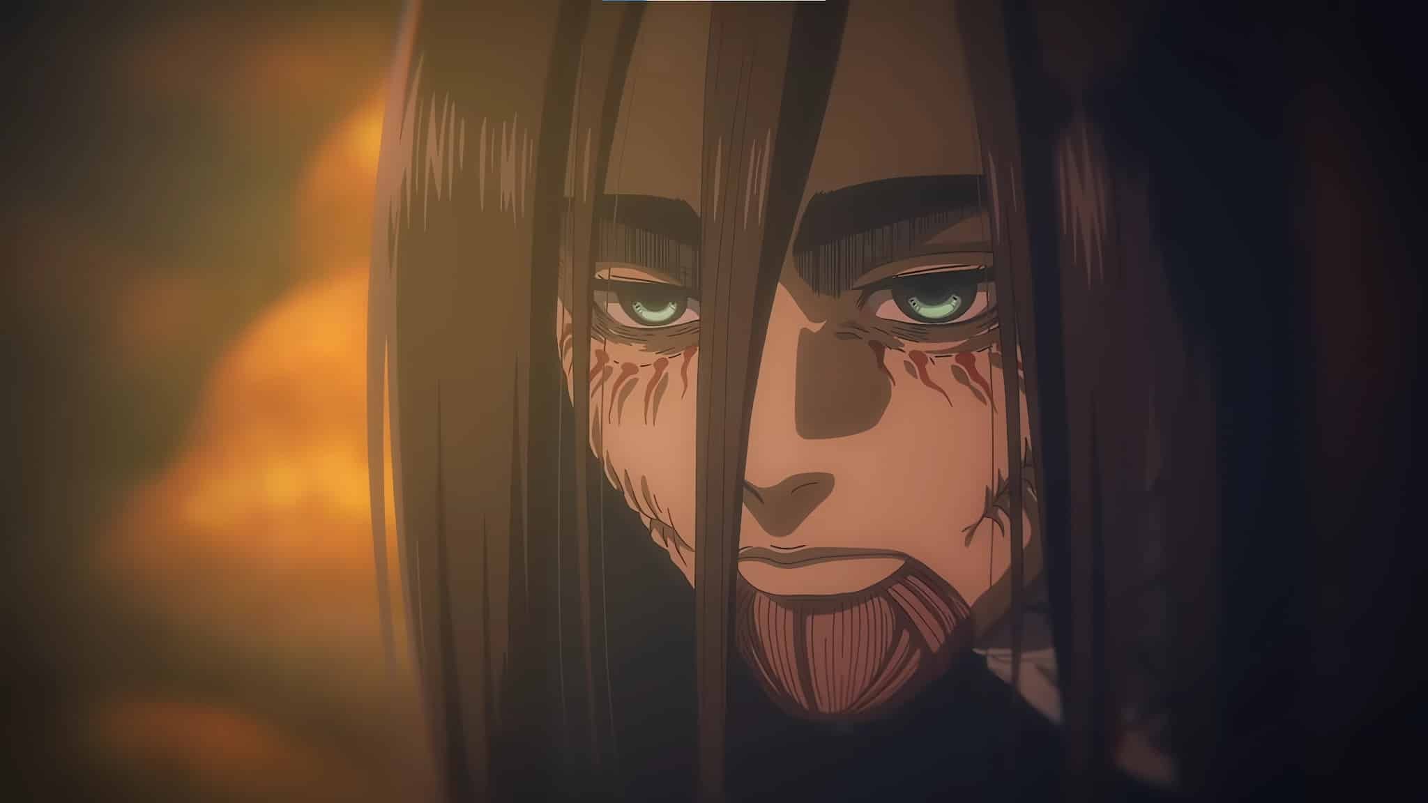 Gros plan sur Eren Jäger aux cheveux longs, le visage marqué, dans l’anime L’Attaque des Titans