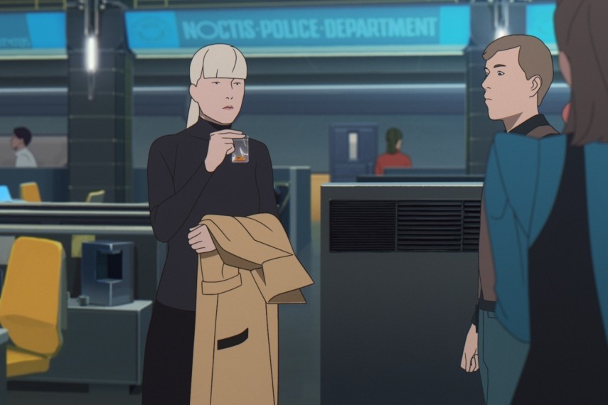 Aline Ruby, manteau sur le bras, dans les locaux de la Noctis Police Department