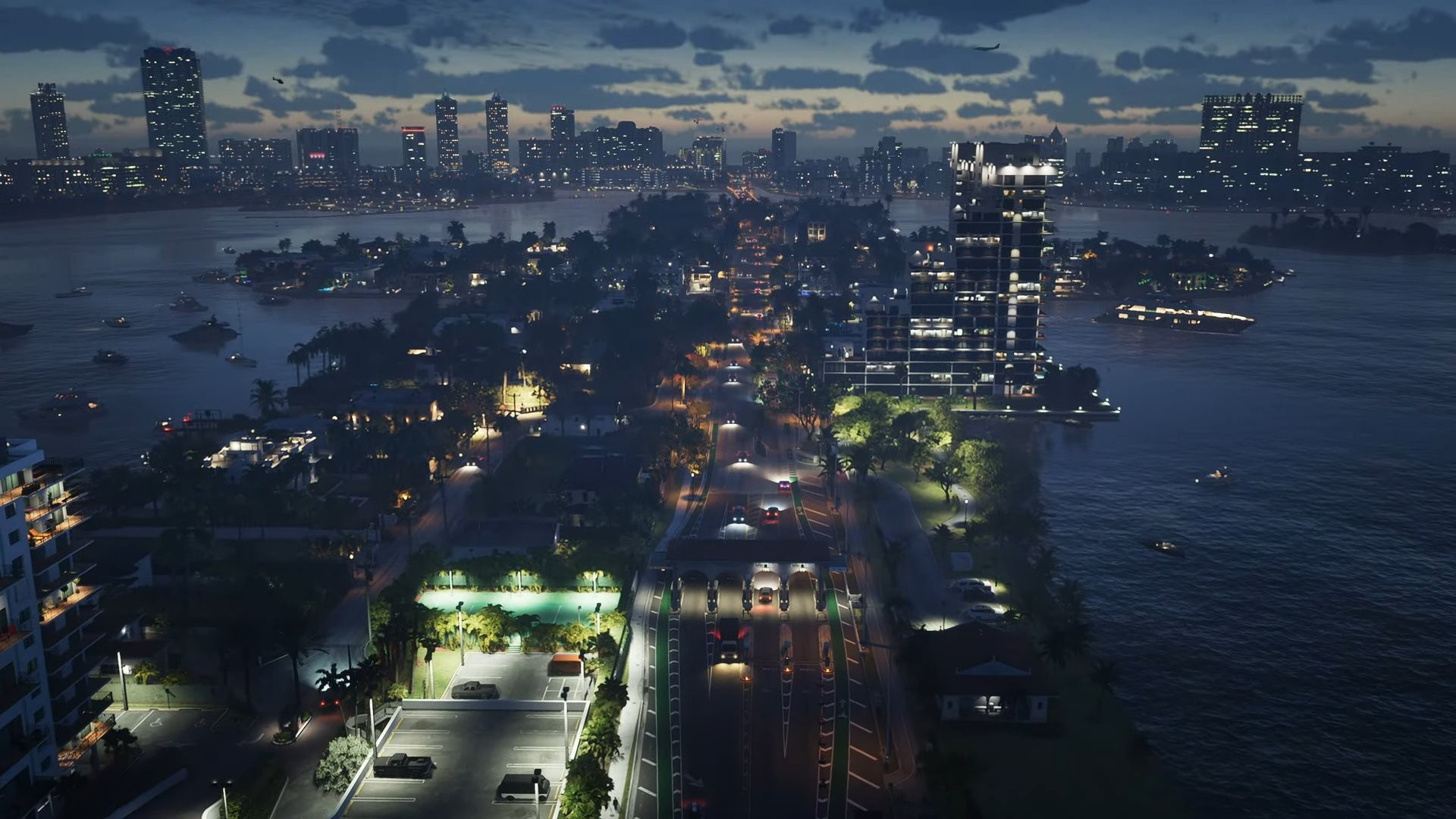 Vue aérienne nocturne de Vice City, ses îles, ses yachts et ses gratte-ciel illuminés