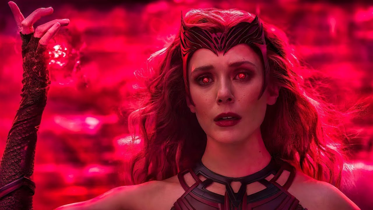 Wanda Maximoff en Sorcière rouge, yeux rougeoyants, la main levée