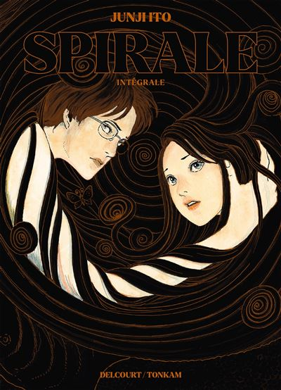 Couverture de l’intégrale Spirale de Junji Ito chez Delcourt/Tonkam&nbsp;: Kirie et Shuichi sur fond de spirales